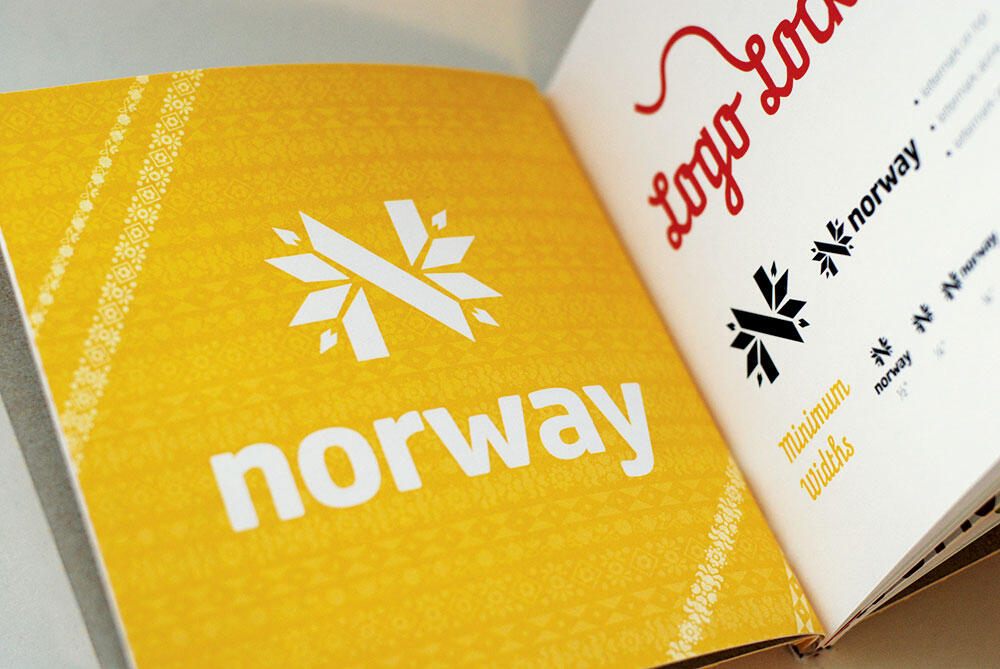 Open book spread: norway with logo