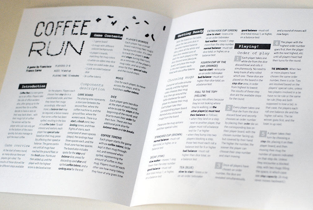 instruction manual open to inside with 4 columns of small text on each page