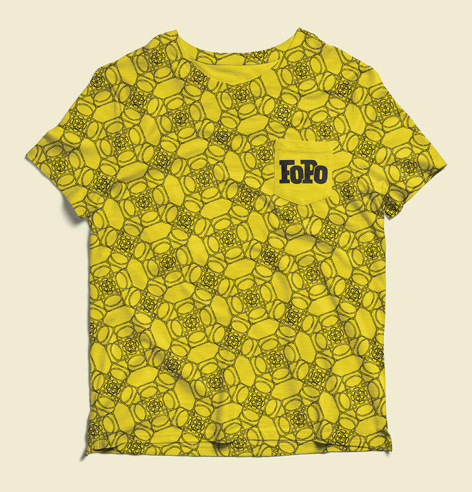 yellow t-shirt with D repeating pattern and "FoPo" logo on pocket